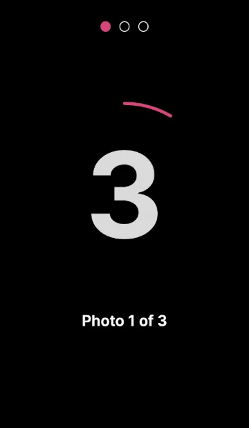 The photobooth screen during the countdown, with a large 3 and Photo 1 of 3.
